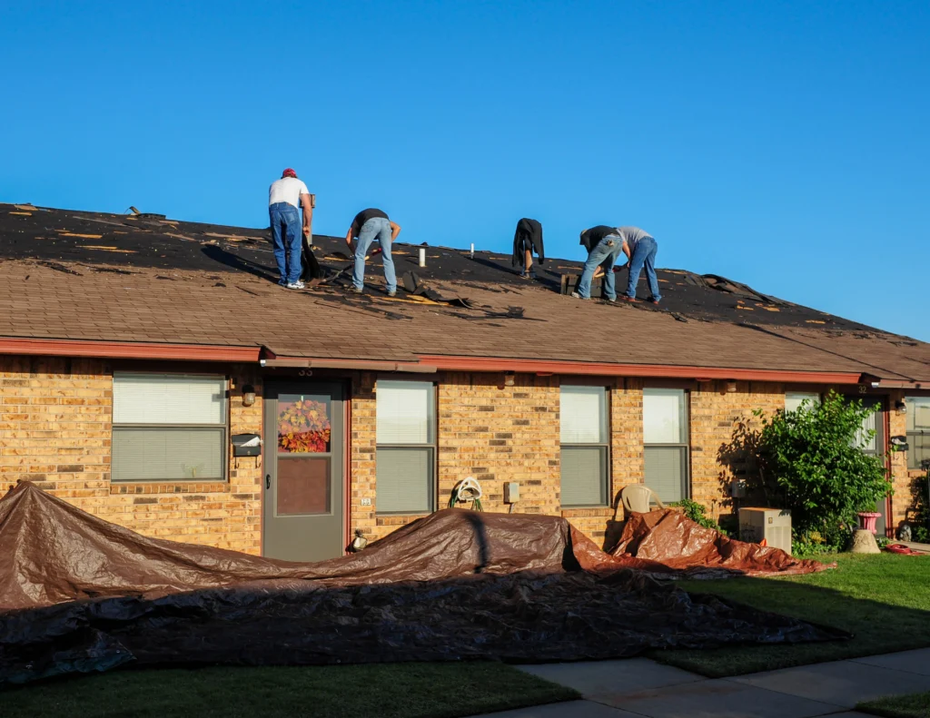 professional crew working on roof