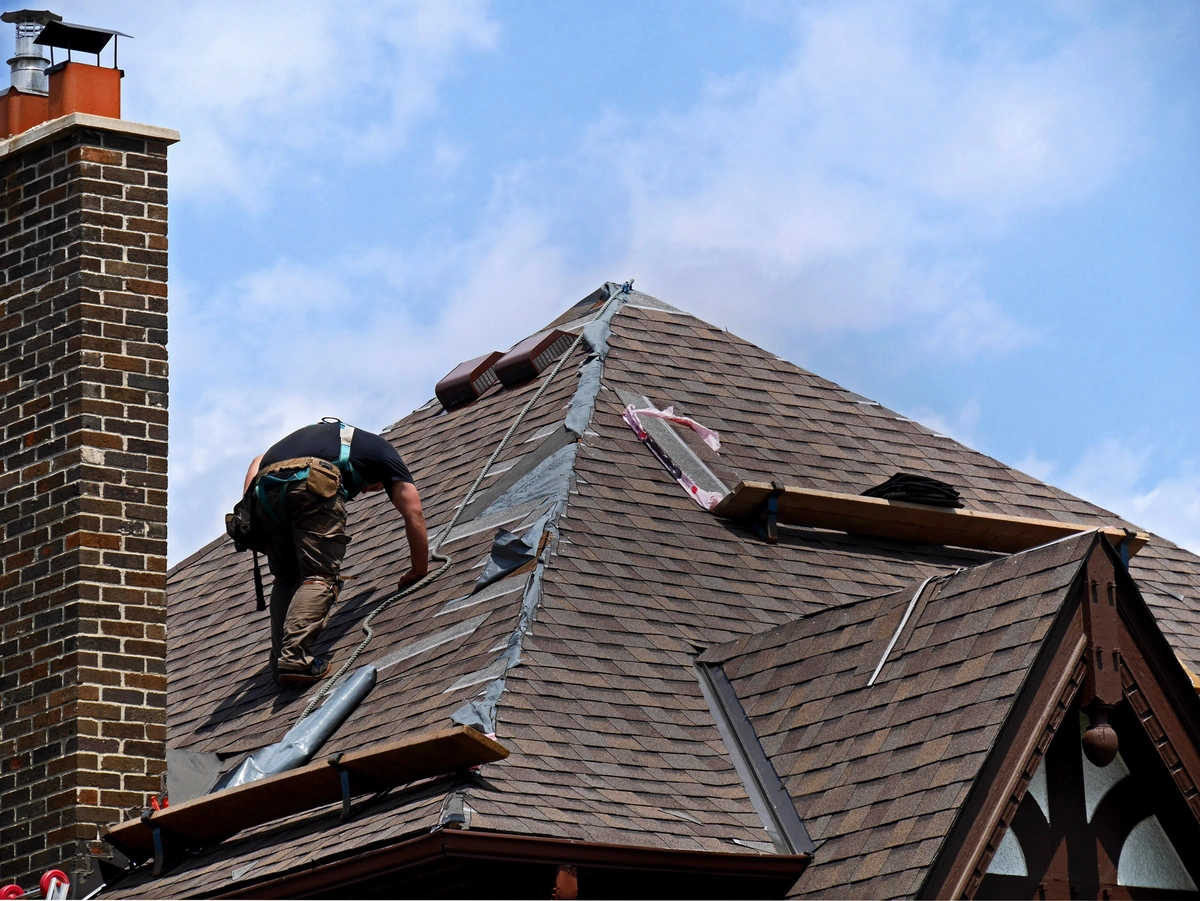 guy-fixing-roof