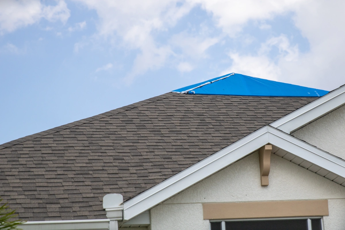 tarp-on-top-of-a-roof