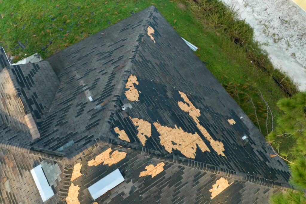 arial view of missing shingles on a roof