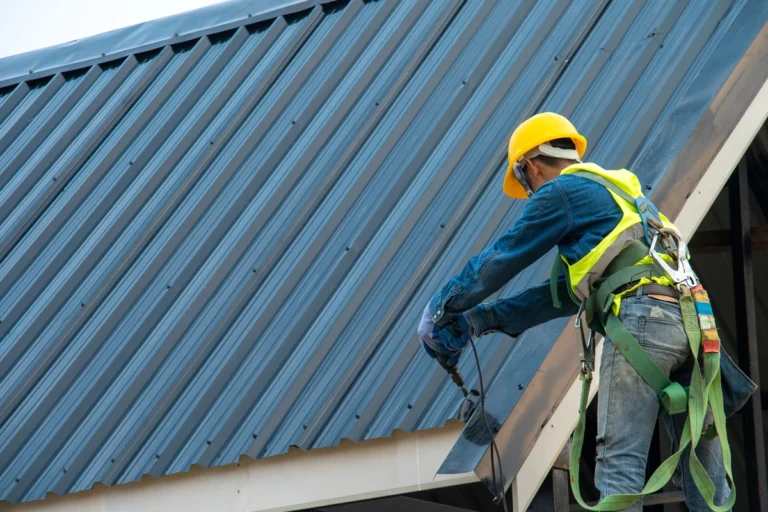 roof tech installing a metal roof