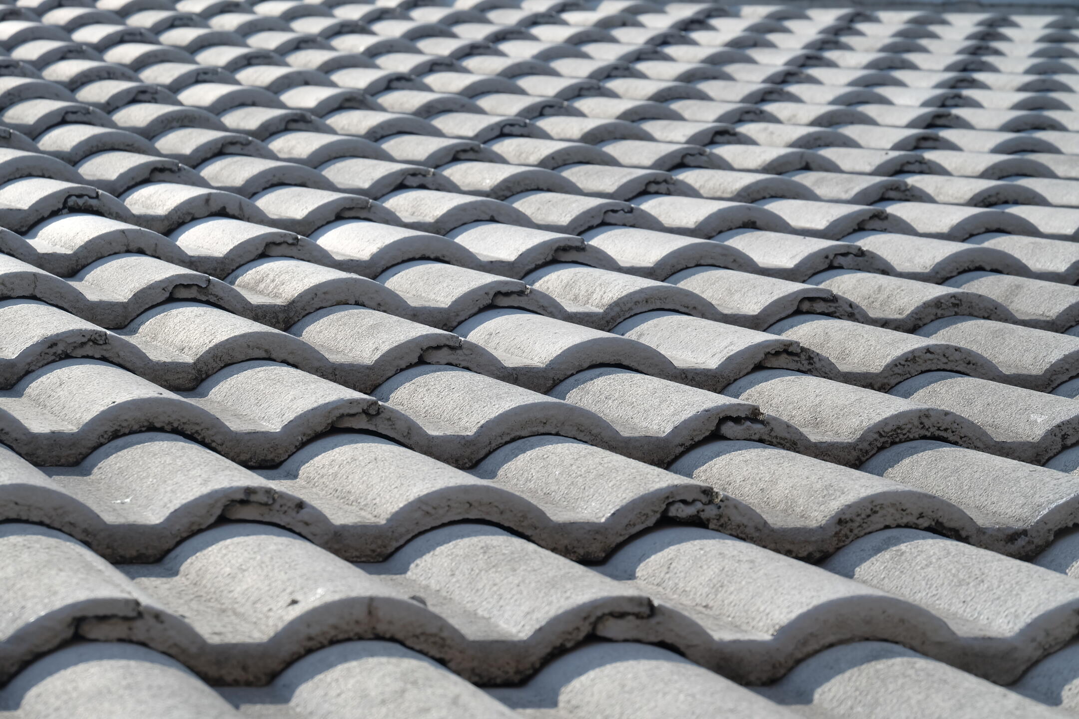 concrete tile roof-close up of rounded concrete roof tiles