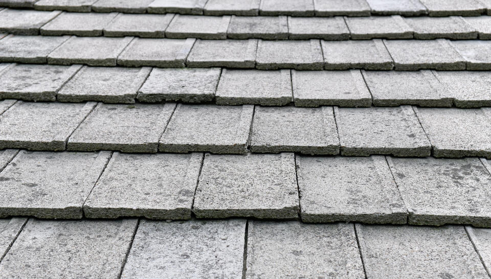 concrete tile roof-close up of squared concrete roof tiles