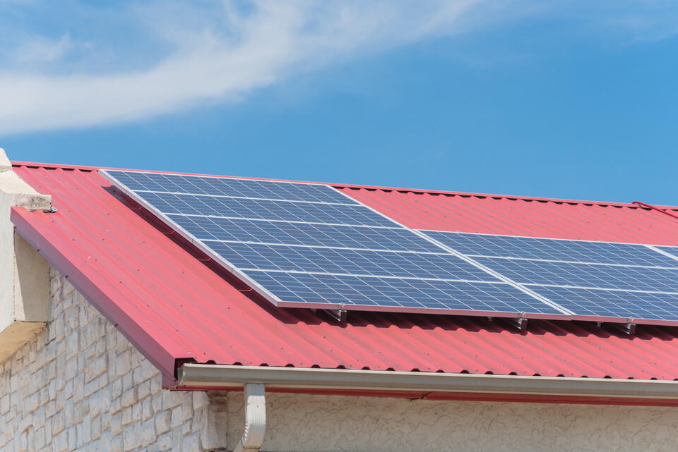 solar panels on metal roof-red metal roof with solar panels installed